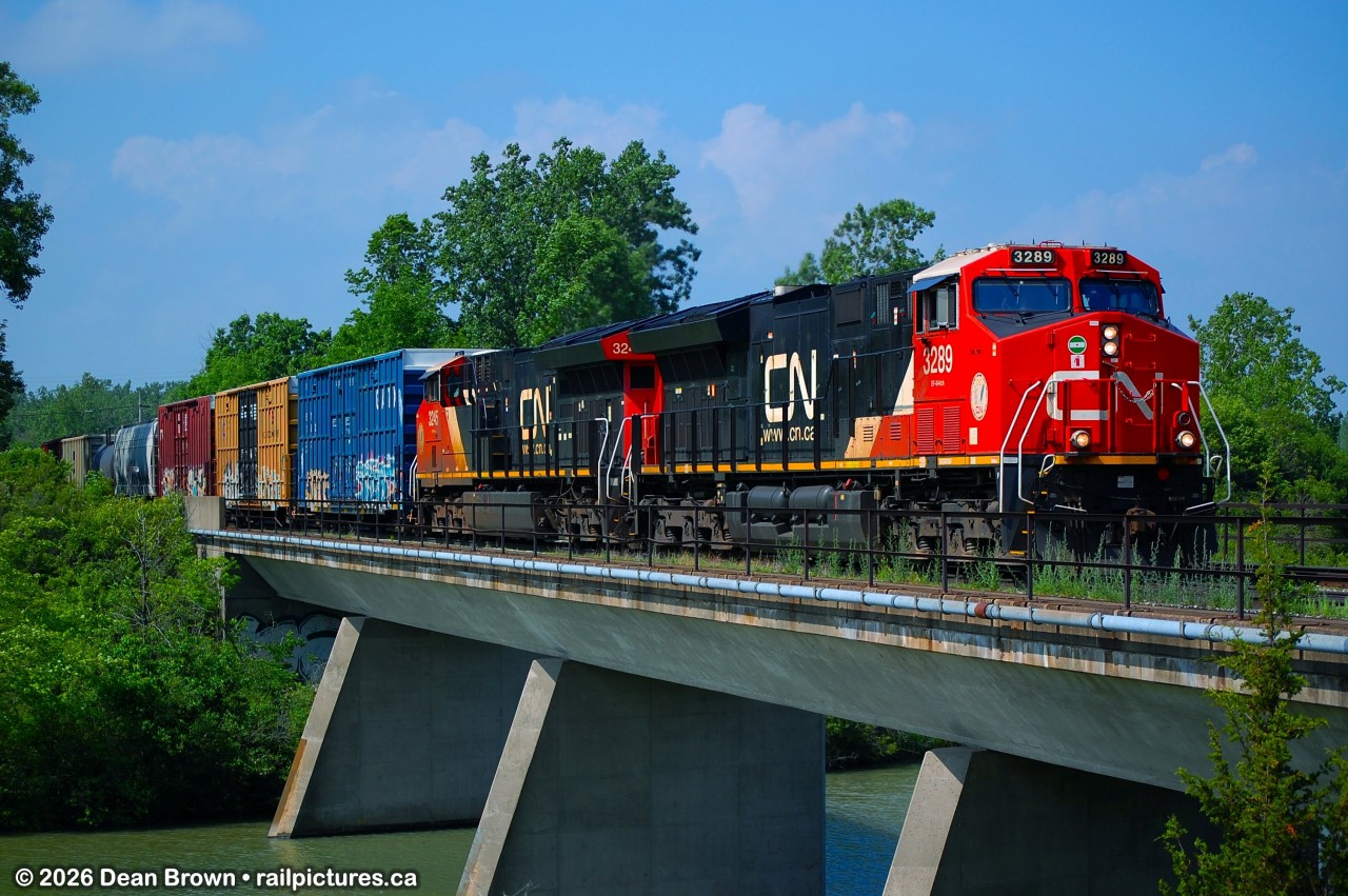 CN ET44AC 3289 and CN ET44AC 3245 just departed Port Robinson East and are crossing over the Welland River on the CN Stamford Sub.