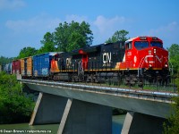CN ET44AC 3289 and CN ET44AC 3245 just departed Port Robinson East and are crossing over the Welland River on the CN Stamford Sub.
