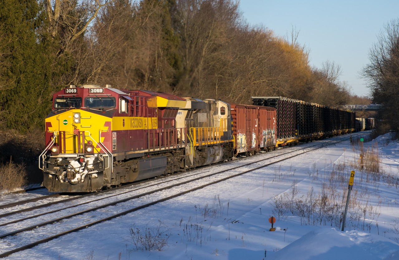 The Wisconsin Central Heritage Unit, CN 3069 leads CN 425 upgrade at Copetown in the last light of a bitter February evening.