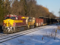 The Wisconsin Central Heritage Unit, CN 3069 leads CN 425 upgrade at Copetown in the last light of a bitter February evening.