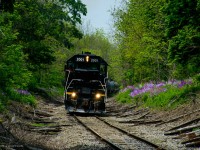 GIO Rail's pair of GP38s crawl up to St. George Street to wait for OSR to <a href=https://www.railpictures.ca/?attachment_id=56803>clear into the yard.</a>  Once lined up, they will depart for Tillsonburg.