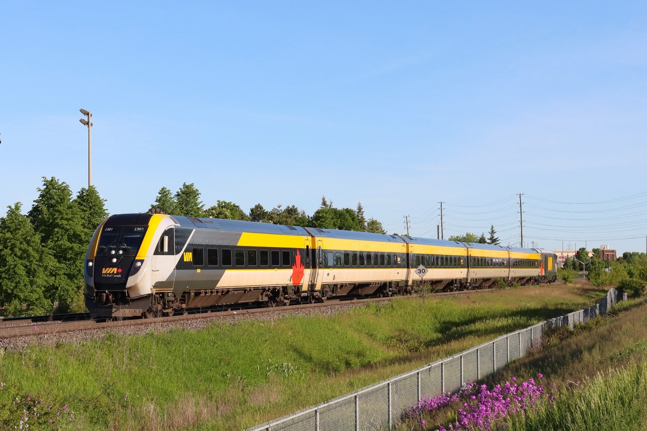 A planned detour due to work on the Metrolinx portion of the Oakville Sub. at Burloak Drive. has V71 operating on the Freight Only portion of the Halton Sub., seen here at Mile 44.6 just west of Appleby Line, Burlington, Ontario. VIA 2202 is providing the power today pushing from the tail end.
