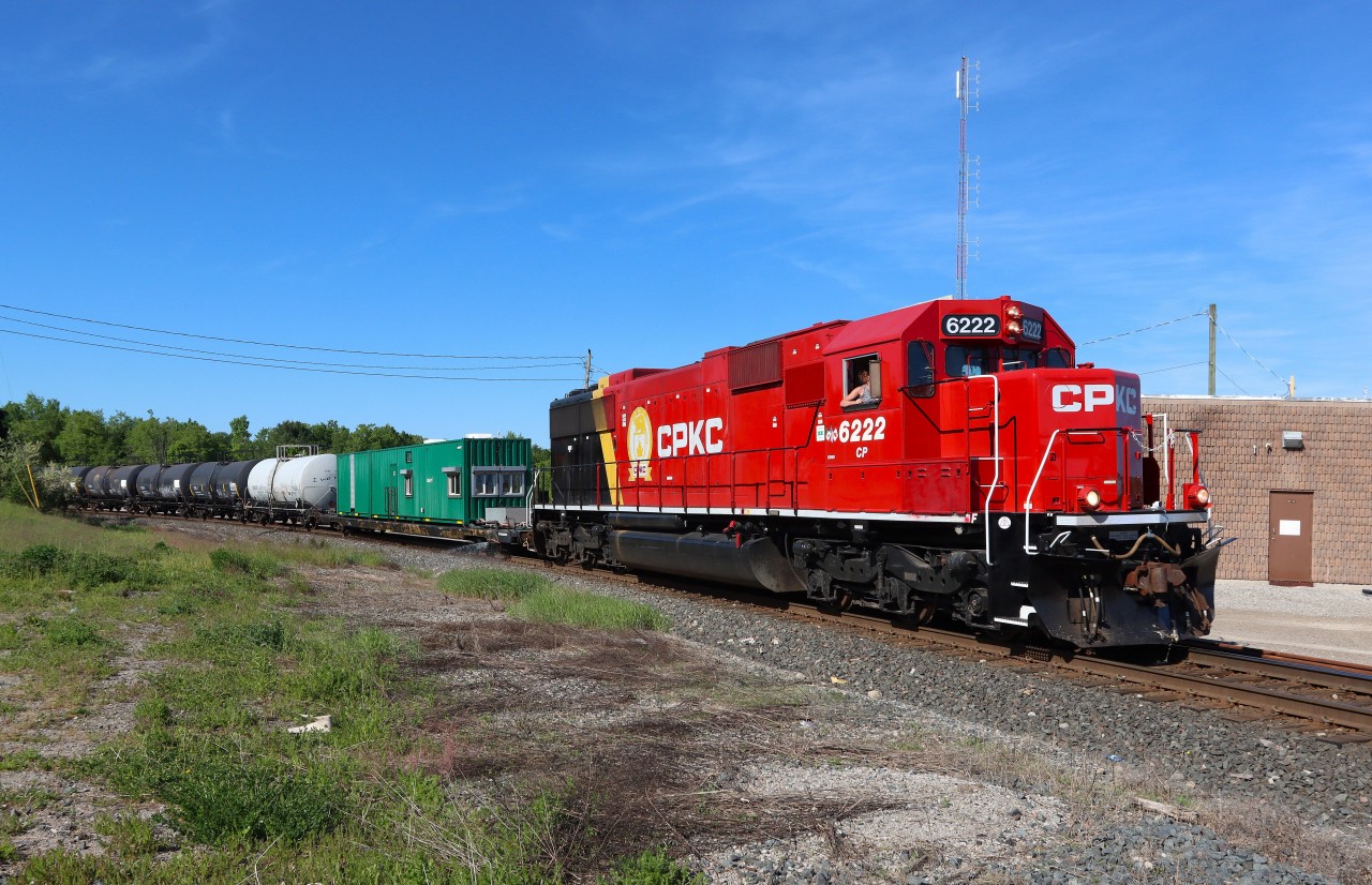 Northbound CP 6222 (former SOO 6022) wearing fresh CPKC paint with weed sprayer consist. Actively spraying as they head around the east leg of the wye toward Guelph Jct. East.