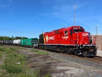 Northbound CP 6222 (former SOO 6022) wearing fresh CPKC paint with weed sprayer consist. Actively spraying as they head around the east leg of the wye toward Guelph Jct. East. 

