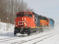 CN 583 returns light power with an assortment of colour after dropping cars off at Paris.