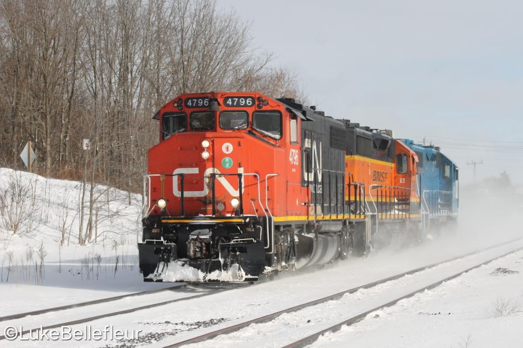 CN 583 returns light power with an assortment of colour after dropping cars off at Paris.