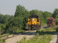 We see OSR 102 heading to Tillsonburg as it passes other stored locomotives. This unit would run a combined job today by itself.