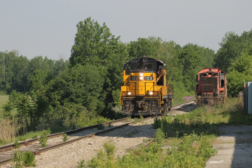 We see OSR 102 heading to Tillsonburg as it passes other stored locomotives. This unit would run a combined job today by itself.
