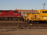 CP 8135 passing by an old CP rail Caboose in Medicine Hat