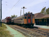 CN 366 waits at Ste Eustache for its 1800h departure to Gare Centrale with a set of CC&F EMU equipment making up the train.

<br><br><i>Scan and editing by Jacob Patterson.</i>