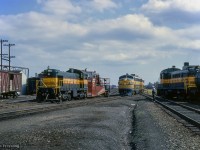 Lots of activity at North Bay as GMD FP9s 1504 - 1510, the power for North Bay - Engleheart mixed train M411, pass between MLW RS3 1309, paused during switching moves, and ALCO S2 1202, seen moving spreader 529 around the yard.  Built in 1957, Paul O'Shell shot this spreader <a href=https://www.railpictures.ca/?attachment_id=38588>back in 2014.</a>

<br><br><i>Scan and editing by Jacob Patterson.</i>
