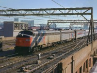 Amtrak train 60, the <i>Montrealer,</i> rolls into Gare Centrale behind an E9 (ex UP) and an E8 (ex SAL.)

<br><br><i>Scan and editing by Jacob Patterson.</i>