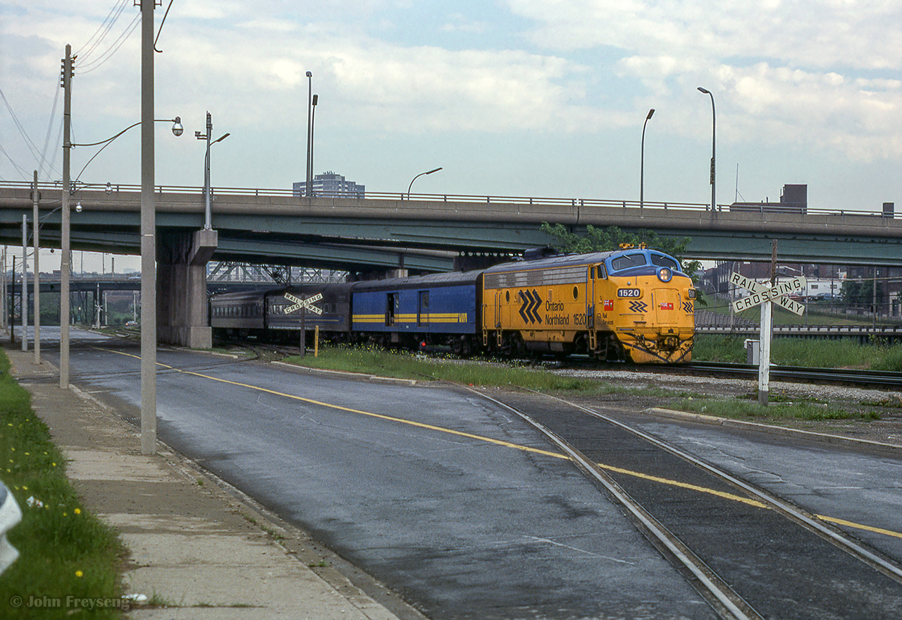 Passing beneath the Eastern Avenue overpass, joint ONR/VIA train, the Northland, nears its final destination of Union Station.

Scan and editing by Jacob Patterson.