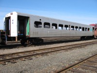 <b> No GO </b> <br>
Stenciled ONT 613 on the vestibule end, this ex-GO Transit commuter car sits on the well-stocked deadline in the ONR yard at North Bay, ON May 4, 2004. <br>
Hawker Siddeley built in 1967 and retired in 2001, it has found its way, with several other retired GO Transit cars to North Bay for rebuild, or as a parts doner. <br>
Also on this day, ONT 608 (ex-GOT 1030, exx-GOT 9930, nee GOT 4730) was in the lineup and looking pretty sad as well.