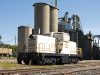 This old engine sat on the siding for months prior. Each time I passed it going to the local indoor pool with the kids, I wished I had my camera. This time, due to the chase of local freight CN 514, i had it! And boy am I glad i did. <br>From fellow contributor Luke Bellefleur, using information posted on the site "Old Time Trains":  Thompsons # nil in new paint scheme and window protectors. Acq. 2/2013 ex Bucyrus-Erie 8302 South Milwaukee, WI nee Normetal Mining # nil. 80-ton GE 28481 10/1946.<br><br>With it boarded up, I knew time wasn't on my side. Next day after this photo, the engine was loaded onto a flatbed truck and hauled away. To where? Not exactly sure, but the next morning my boss came into work quite excited. Tells me his story:"You'll never guess what I did, I followed an engine all the way home!" Last known sighting was just inside the sleepy city limits of Kent Bridge, Ontario. Destination still unknown to this contributor.