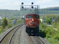 May 19/2016 my train is on the double portion of the  CN's Halton Sub between  Mansewood and Milbase waiting for eastbound SD70M-2 8960 east as the train moves through the long super elevated  S curve. 
To the right of my train is the "Milton Hilton" as its nicknamed. 
Its the Maplehurst Correctional Complex. We joke that any escapees could easily hitch a ride on the train????