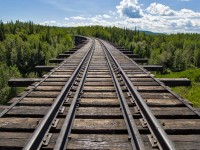The old Pouce Coupe Trestle. Built in 1930 by the Alberta Northern Railway, this bridge is now owned by CN and is currently unused. These bridges are quite impressive.