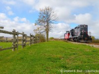 Approaching Mclaughlin Road near the north end of Brampton, the Credit Valley Express is almost at Snelgrove where they will run-around their train and head north. GP9 4014 was only assigned to the line a few months and was sent away due to mechanical ailments.