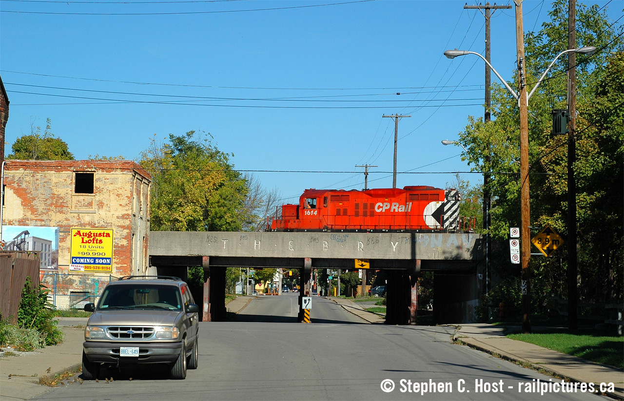 Signs of the TH&B are abound in Hamilton as a Kinnear to Aberdeen yard transfer rolls by the elevated right of way in the southern part of town near the Hunter St. Station area.  This transfer had a crap ton of steel for the Steel Centre on it and surely that solo GP9 was working hard. I enjoy photographing around here but without a drone or major elevation it is a challenging place for photography of trains. I've pulled off a few shots over the years.