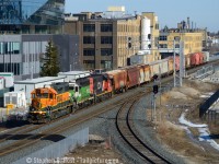 What a difference a few years makes. When I first spent time around here, there was some kind of business jutted in the middle of the Huron Park Spur and the GEXR mainline. <a href=http://www.railpictures.ca/?attachment_id=11249 target=_blank>Then a layover yard was built.</a> Google has since sprung up, built three buildings, and large condos are now built all around this site. That business located by the tracks was razed and a parking garage was built for exclusive use by Google. Us Kitchener area "locals" anticipated the day it would open for nice vantage points for us non drone photographers. Pictured is the entire train 568 rolling through downtown Kitchener by Google's campus and the GO Park Ave layover facility. The Huron Park spur is at the bottom right.