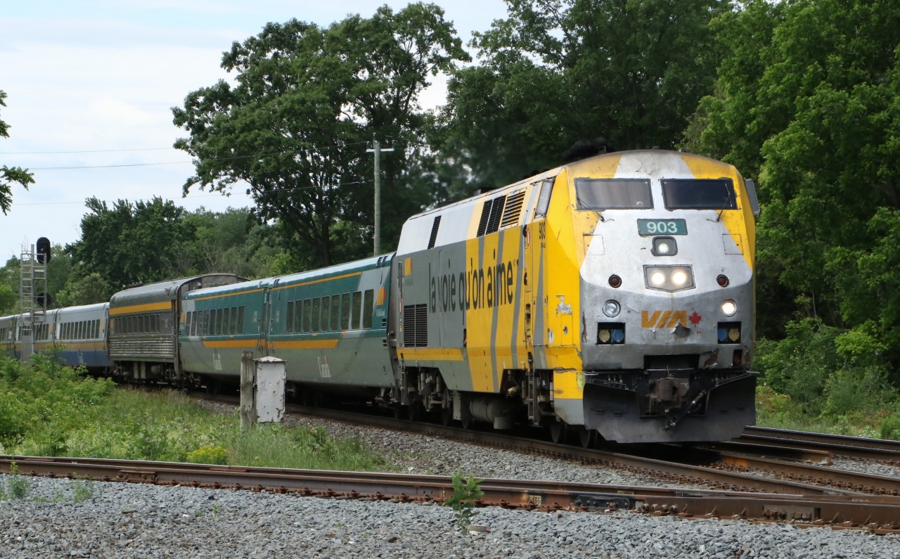 Looking worse for wear, this VIA Rail GE P42DC is seen travelling through CNR Carew on it's way to the Woodstock Via Station.