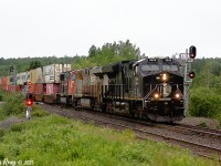June 30th 2025, the last time I shot the IC Heritage unit (CN 3008) leading CN Z120. Seen here at Oxford Jct NS.