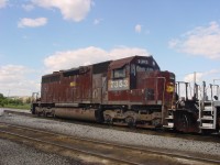 Talk about being a little worse for the wear.

Ex Southern Pacific SD40R 7353 sits at Mac Yard on 6/20/2004
Southern Pacific Railroad SD40R 7353. Built as road number 8449 in April 1966 on EMD Order 7861, it was rebuilt to SD40R 7353 in February 1981, retired from the UP December 23, 1998, later became NREX 7353, and later still became FWWR 2016

I don't use another persons photo, but you can look up this locomotive on Google and see what it looked like in its prime.
A beautiful shot of 7353 leading with Mt.Shasta can be seen at this link
https://www.facebook.com/groups/350648048350702/posts/9314445285304222/
