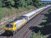 VIA 6900 heads two VIA LRC trains running as one in Wesleyville, Ontario on August 6, 1987.