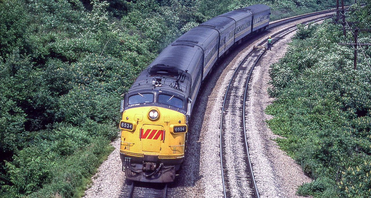 VIA 6534 is westbound approaching Bayview Junction, Ontario in June 1981.