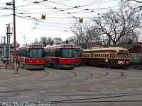 An assortment of streetcars sit in TTC's Russell Carhouse yard awaiting the call to duty...except one. TTC PCC 4500, one of two historic PCC streetcars kept by the TTC, sits on the far track in storage next to 4132, 4161, 4001 and other CLRV cars. Going into the main building and asking politely, we were <a href=http://www.railpictures.ca/?attachment_id=56572><b>escorted into the yard</b></a> (private property, no trespassing!) by a kind TTC employee and allowed to take some closer and interior photos of 4500 (4549 was buried further back and not accessible for photos).<br><br>4500 was part of the final order of new PCC streetcars built for Toronto in 1951 (A9-class 4500-4549, built by CC&F). In the late 1980's the TTC rebuilt a handful of those cars into A15-class 4600's for the new harbourfront LRT route. 4500 and 4549 were rebuilt in 1989, but retained their original numbers, were rebuilt close to their original appearance, and were repainted into their original livery. When the TTC disposed of their A15's in the mid-90's, both cars were retained for the historic fleet.<br><br>Many years later, when the CLRV fleet retired in 2019, car 4001 was also kept by the TTC as part of the historic fleet.