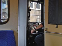 The CN engineer in charge of GO Transit cab car 242 keeps her speed down and the bell ringing as we pass by the TTR's John Street Interlocking Tower, having just departed Toronto Union Station on train #257 (one of the afternoon Toronto-Bramalea "Bramalea Flip" trains, this one departing at 11:30am off Track 1, on-time). The click-click-click of the throttle would soon bring the train up to a slightly faster speed departing the USRC at Strachan Ave.<br><br>Back in 2005-ish there were no new cab cars (that have an enclosed cab and no see-through windows for passengers to watch out the front), little security concerns, and the cab car door was open more often than not. It was fun sitting there looking out the front "railfan seat" window the whole trip, while glancing across and watching the speedometer hover around 80 miles-an-hour (about 130 km/h) on the stretch past Woodbine Racetrack between Etobicoke North and Malton, and after Malton on the approach to Halwest, with bell ringing for any crossings and the wind whistling through the engineers' open cab window. <br><br>IIRC, the beginning of the end of the GO cab car "railfan seat" was in the late 2000's or early 2010's when GO switched to having two crewmembers in the cab, and started installing pull-down blinds on the conductor's side of the cab partition because of this.