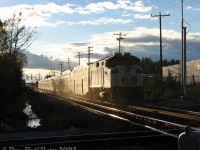 GO Transit F59PH 522 gives evening Georgetown line train #207 a big push out of downtown Brampton at sunset, clearing the <A href=http://www.railpictures.ca/?attachment_id=35631><b>CN-OBRY diamond</b></a> and making the climb upgrade to Mount Pleasant GO station with cab car 240 in the lead.<br><br>Back when Brampton station only had a single platform, the crossover here was regularly used by VIA trains to get to/from the north track for <a href=http://www.railpictures.ca/?attachment_id=852><b>station stops</b></a>. GO and CN rarely, if ever, used it (since Mount Pleasant also only had a north track platform at the time, all GO trains ran on the north).<br><br>GO 522 would have an interesting post-Toronto career, being sold to RB Leasing in 2009 as RBRX 18522 and operating in VIA service in Quebec for a bit, before being sent to California and leased to Metrolink for commuter service. Larry's Truck and Electric came to own it, and when it finished its time on Metrolink it was sold to a Mexican operation for passenger service, and subsequently destroyed in a wreck and scrapped on site.