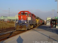 Wasting no time after picking up their train at CN's MacMillan Yard, GEXR #431 speeds through Bramalea GO station with RLK GP40 4096, LLPX GP38 2210 and GEXR GP40 4019, "Beating the GO rush" and making a run for the grade up to Mount Pleasant before the first Georgetown-line GO train is due. The trip back was when GEXR #432/431's power got tested the most: track profiles show the elevation climbs from about 600 feet above sea level at Bramalea to 800 feet at Mount Pleasant, drops a bit for the Credit River, climbs again to almost 900 feet by Georgetown, and rises to 1200 feet for the grade through <a href=http://www.railpictures.ca/?attachment_id=17821><b>Limehouse/Acton</b></a>.<br><br>It was always nice to get "Canadian" leader RLK 4096, which was originally one of the 15 GP40 units built for CN as 4006/<a href=http://www.railpictures.ca/?attachment_id=48635><b>9306</b></a>.