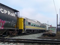 Seeing some <a href=https://www.railpictures.ca/?attachment_id=59414><b>recent photos</b></a> posted of Waterloo Central's RDC-9 (WCR 6006) in service reminded me of an earlier encounter with the same car:<br><br>Wandering around CP's North Toronto Sub with a friend, the usual CP #T56 transfer to West Toronto put in an appearance at <a href=http://www.railpictures.ca/?attachment_id=53828><b>Davenport Diamond</b></a>. By surprise, it had this random ex-VIA RDC-9 buried in its train, DAWX 6006, which we later found out was heading to the Orangeville-Brampton Railway. It's pictured just about to slam the Davenport Diamond with CN's Newmarket Sub, marshalled between two hoppers for forwarding.<br><br>The origins of this car can be traced to the Boston & Maine Railroad, the only owner of the RDC-9 model (30 cars were built by Budd for the B&M in 1956 as full coaches, with no end cabs or controls, and only one engine - essentially a <a href=https://www.railpictures.ca/?attachment_id=56107><b>trail-only</b></a> RDC). Numbered 6925, it and six other RDC-9 cars were sold to Canadian National in 1965 (as CN D506/6006), changing hands to <a href=http://www.railpictures.ca/?attachment_id=39228><b>VIA Rail</b></a> in the late 70's. It continued in service into the mid-1980's before being retired and later sold to a Quebec area railway equipment dealer (the ownership details are a bit mirky, but they eventually came under ownership of dealer David A. Walmseley (DAWX)). Most of the cars were dispersed years later, and 6006 went to OBRY in Orangeville to join the small collection of passenger cars on the Credit Valley Explorer. It was put into service as a non-powered coach a number of years after sitting stored in Orangeville. When the CVE disbanded at the end of Cando Contracting operations on the OBRY, the passenger cars were sold off. 6006 and some other cars were all sold to the Waterloo Central Railway.