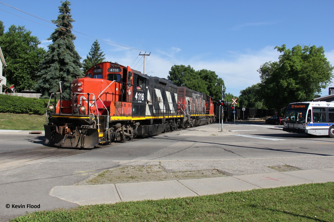 Two years ago today, CN 540 begins its trek down the Huron Park Spur (HPS) with CN 4116-CN 4791 for power. It is pictured crossing Victoria St. @ Walnut St.