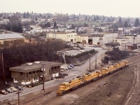 While BC Hydro had four SD38 units (one SD38AC and three SD38-2s), catching all four together was not common.  Looking eastward from the Queensborough road bridge on Tuesday 1982-03-23 provided this view of BCH 384 + 381 + 383 + 382 waiting at the Trapp Yard main office in New Westminster in preparation for taking a Valley Freight train eastward to Huntingdon interchanges with CP, BN and MILW.