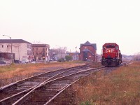 Geez. Rainy dull day at Niagara Falls.  I guess you could say, 'it figures' since I am out to catch a CP detour over the CN Grimsby. Work in the TH&B Hunter Street tunnel in Hamilton necessitated this unusual activity. Behind the CP 5825 up front is HATX 514 and CP 5862 and a rather long train. Gordy Rivers is the hogger. Nice guy that he is, he killed the ditch lights for this shot. The train is waiting for permission to cross the bridge to the USA.
I posted this image mostly for the local fans to appreciate how the area around the NF station has changed over the years.