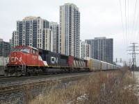 Back to 2015 for this one: CP vehicle train no.147 rolls through the control point at Bloor with power from the other railroad up front, including 5562, a GMD-built SD60F 'draper taper'.