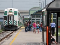 Some of the usual suspects patronizing the afternoon Georgetown line trains (Union-Bramalea service, aka the "Bramalea Flip") including students, businessmen, parents with strollers and people heading into Toronto for an afternoon or appointment downtown, wait at Bramalea GO station as train #263 with cab car 219 pulls into Platform 3 on the Bramalea commuter lead. Arrival time is 1:31pm, on-time after the train's usual departure from Union at 1pm. In about 14 minutes, the train will depart at 1:45pm back to Toronto as #266 with F59PH 523 leading on the other end, arriving on Track 1 around 2:18pm as per trip notes.<br><br>Since unrebuilt 219 didn't yet have a full cab, it became our chariot of choice for the ride downtown: standing in the A-end doorway shooting out the rear window for part/most of the trip (back when one could still do that sort of fun thing).