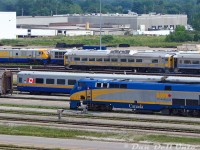 There's more than a few "changing of the guard" comparisons that could be made here, as VIA P42DC 912 sits in VIA's Toronto Maintenance Centre yard with an array of active Budd HEP and LRC cars, as well as three of the retired LRC locomotives awaiting disposal (that the P42's replaced in 2001) including 6914, and five of the RDC cars sold to FarmRail (but stored at the TMC) including 6113. Some of the Renaissance cars and F40's were also lingering around the TMC.<br><br>Some stuff here remains in service today, some has since been dispersed to museums, tourist railways or scrapped, and others are on borrowed time due to Siemens trainsets and recent announcements for more new power and equipment for VIA. The ironic part is, the five RDC's (since dispersed between the VIA Historical Society and Waterloo Central) and maybe the Budd HEP cars will probably outlive almost everything else.