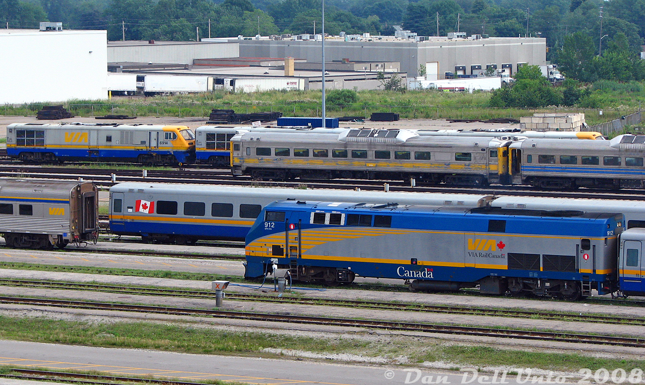 There's more than a few "changing of the guard" comparisons that could be made here, as VIA P42DC 912 sits in VIA's Toronto Maintenance Centre yard with an array of active Budd HEP and LRC cars, as well as three of the retired LRC locomotives awaiting disposal (that the P42's replaced in 2001) including 6914, and five of the RDC cars sold to FarmRail (but stored at the TMC) including 6113. Some of the Renaissance cars and F40's were also lingering around the TMC.

Some stuff here remains in service today, some has since been dispersed to museums, tourist railways or scrapped, and others are on borrowed time due to Siemens trainsets and recent announcements for more new power and equipment for VIA.