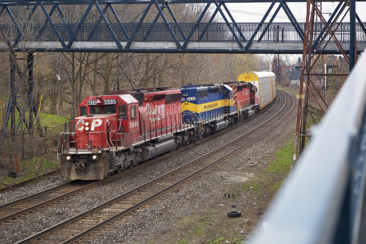 In May of 2014, CP train no.147 showed up around the bend at the Rosedale pedestrian bridge with three SD40-2's hauling a train of autoracks for the Indiana Harbor Belt in Gibson, IN, outside of Chicago. This was back when CP Rail was still fun. James Adeney might have his videos and photos of this train somewhere!
