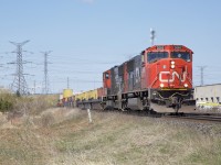 On May 6th, 2014, I was at the 14th Ave crossing of the CN York Subdivision shooting train Q149 with 5665 on the point. I had just gotten my then-new Canon 5D Mk III two months previous and was having a lot of fun taking it out railfanning that Spring.