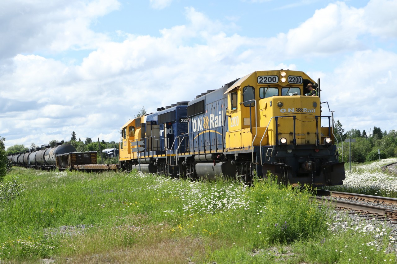 ON2200 ( EMD GP40-2) leads ON2201 (EMD GP40-2) into the Cochrane yard on a sunny Friday July 03rd.