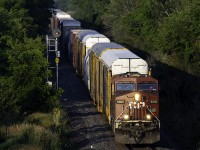 CP 8803 leads a slow moving eastbound into Trenton on a beautiful July morning.