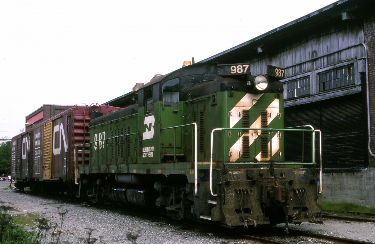 Having just arrived on VIA's Super Continental, I noticed several BN units in the yard adjacent to what is now the Pacific Central station (at the time, the CN station and site of local offices--the station not yet having been conveyed to VIA; VIA had only officially become its own crown corporation on April 1st). The NW5 is one of only 13 built, 10 for Great Northern...EMD's answer to Alco's RS1 and a predecessor of our own GMD1s. The freight shed in the background is part of former GN facilities in central Vancouver including, until the mid-1960s, it's own station.