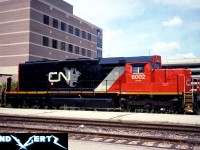 Still fresh CN SD40u 6002 is pictured on display in downtown London, Ontario in June 1993 to celebrate the city’s bicentennial of transportation. The recently rebuilt unit was on display with brand new Conrail SD60M 5564, which had just rolled out of London’s GMDD plant, located only a few miles away. Also, on exhibition for the event were black CN plow 55614, two VIA Rail 5500-series coaches and a CP 85000-series boxcar.
<br>
SD40u 6002 was originally built as CN SD40 5118 during 1969 at the GMDD plant in London and was eventually remanufactured by AMF in Montreal and released on January 26, 1993. Many years later, both it and sister SD40u 6004 were severely damaged in a wreck at Alix Junction, Alberta in May 2007 and subsequently retired. 

