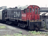 One of the many S-13 switchers that were constantly moving passenger equipment around the Union Station complex is shown parked at the diesel terminal in August of 1983. In addition to the CN 8522 shown here, there was quite a collection of whatnot on hand at the engine house.