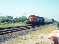 No mapping of this location here. If you've been to mile marker 242 of CN's Kingston Sub., then you've certainly have memories of train watching! That's because shown on this bright afternoon, I made my first visit to Memory Junction. This was surprise number 2 of the day, upon an invitation by my grandparents (pictured is my grandfather). They knew the 'owner' Ralph Bangay. Main exhibits were displayed inside the old station, with plenty of old rolling stock on the sidings that ran behind the station. 
<br>
<br>
Through time, I would visit a few more times and was never disappointed by the action on the Kingston. Not only that, but just a stone throw away was CP's Belleville Subdivision...plenty of trains.
<br>
<br>
Sadly, Ralph passed away. So too did my grandparents. The museum was closed, and all artifacts were sold or donated elsewhere. Not all was lost. The station is still there, and I believe is still a commercial business. But that's not all.....
<br>
<br>
....the memories still live.