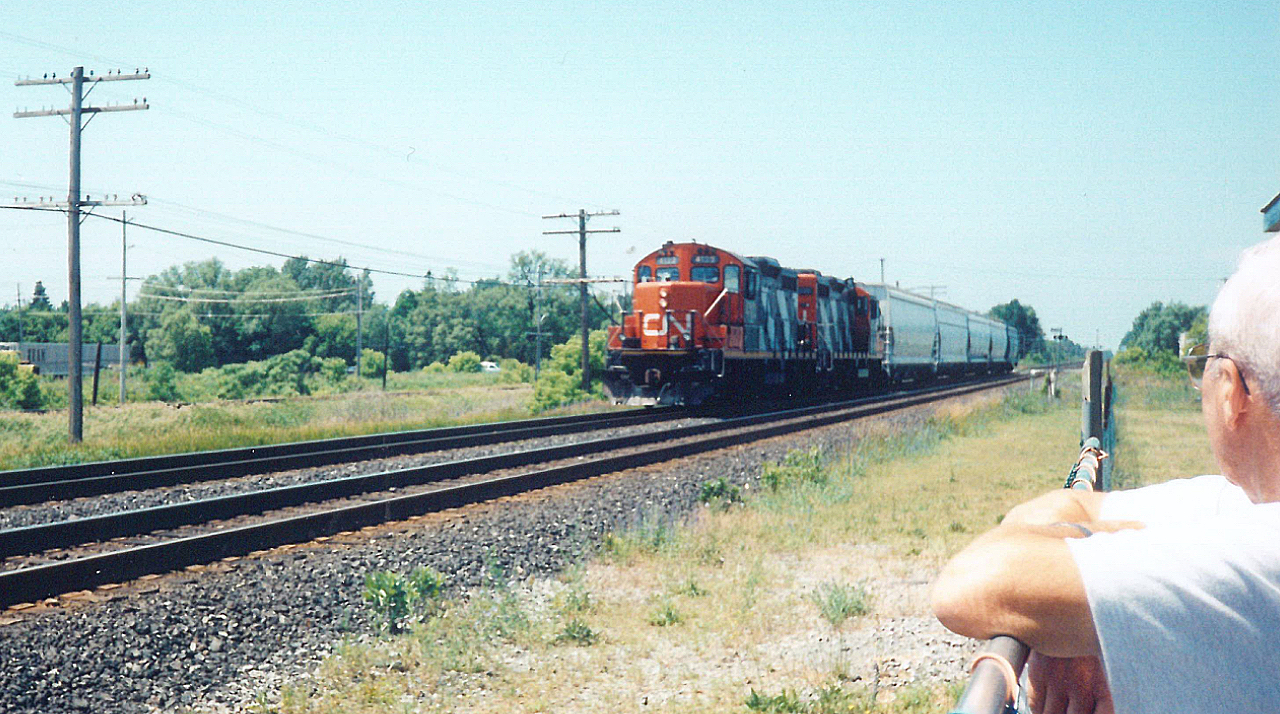 No mapping of this location here. If you've been to mile marker 242 of CN's Kingston Sub., then you've certainly have memories of train watching! That's because shown on this bright afternoon, I made my first visit to Memory Junction. This was surprise number 2 of the day, upon an invitation by my grandparents (pictured is my grandfather). They knew the 'owner' Ralph Bangay. Main exhibits were displayed inside the old station, with plenty of old rolling stock on the sidings that ran behind the station. 


Through time, I would visit a few more times and was never disappointed by the action on the Kingston. Not only that, but just a stone throw away was CP's Belleville Subdivision...plenty of trains.


Sadly, Ralph passed away. So too did my grandparents. The museum was closed, and all artifacts were sold or donated elsewhere. Not all was lost. The station is still there, and I believe is still a commercial business. But that's not all.....


....the memories still live.